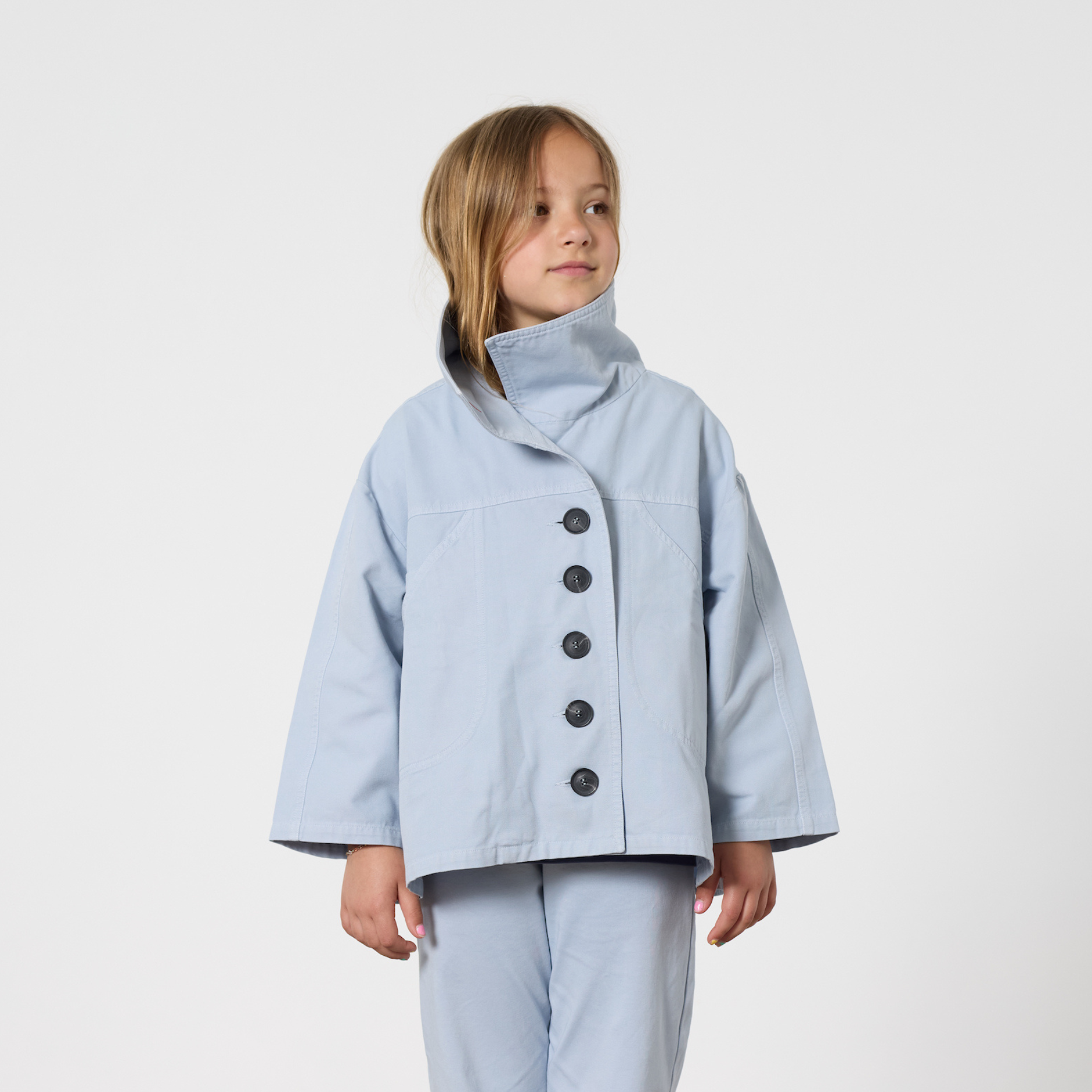 Toddler girl wearing TwoThirtyTwo regenerative cotton interlock outfit