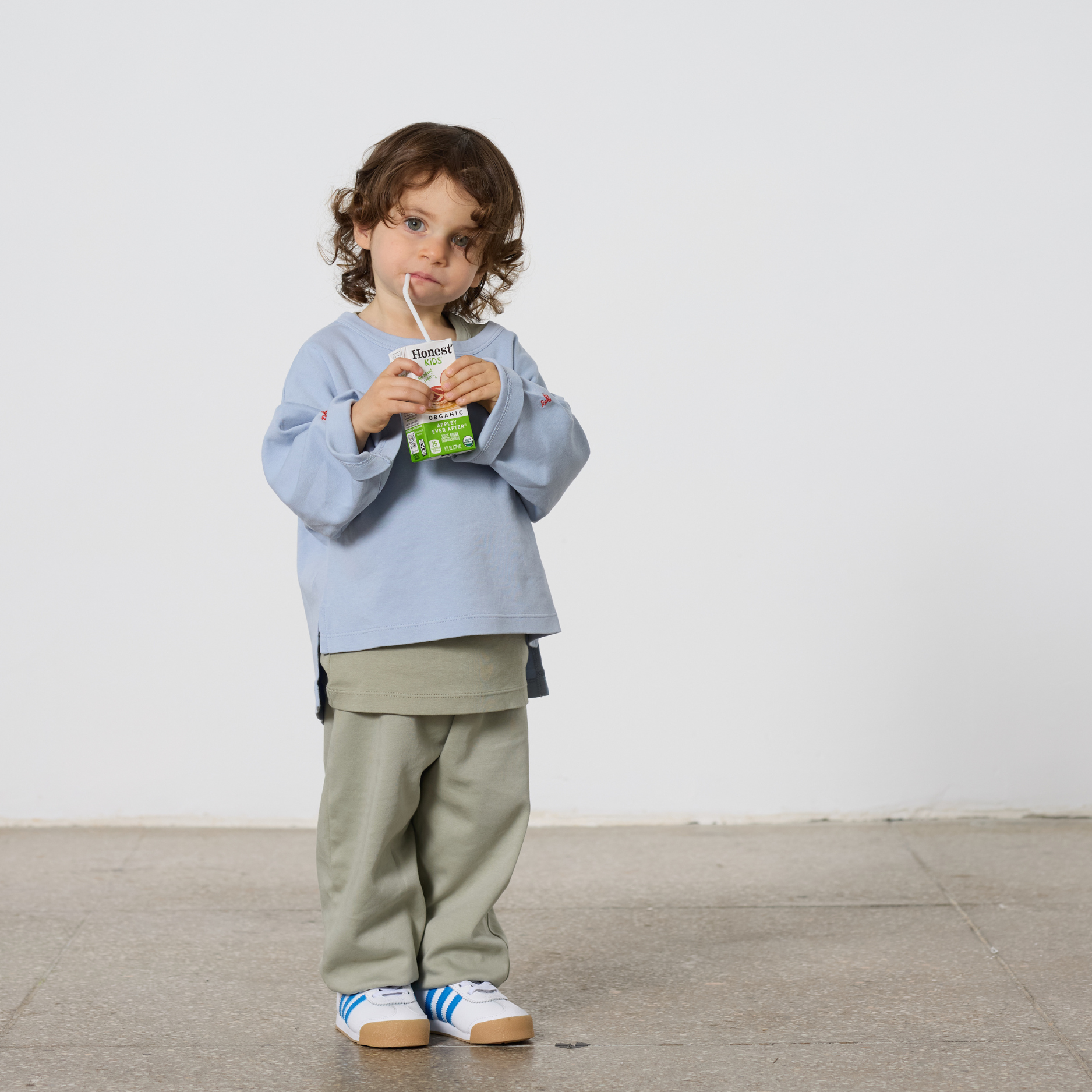 Toddler girl wearing TwoThirtyTwo regenerative cotton interlock outfit